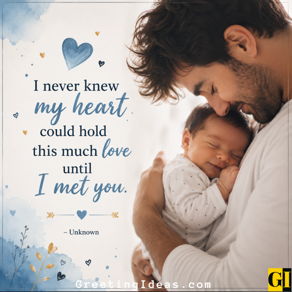 Father kissing his newborn son's forehead while baby smiles softly